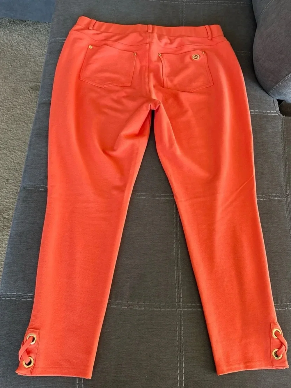 Michael Kors Coral Skinny Ponte Pants with Grommet Hem Detail. L